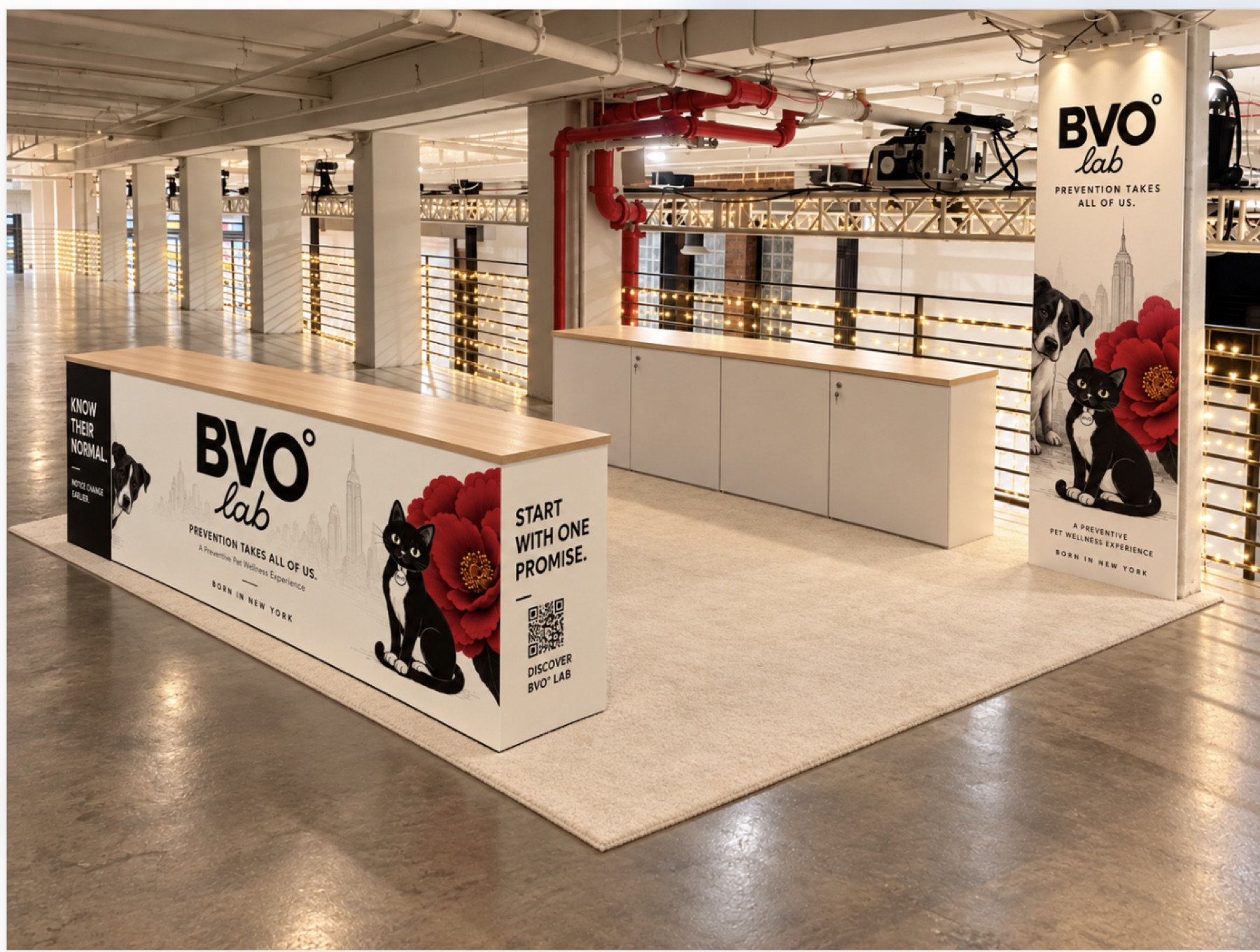 Rendering of the BVO° Lab booth: a white counter wrapped in the BVO° Lab graphic with a dog, a black cat and a red camellia, a branded pillar banner, and a light carpet.