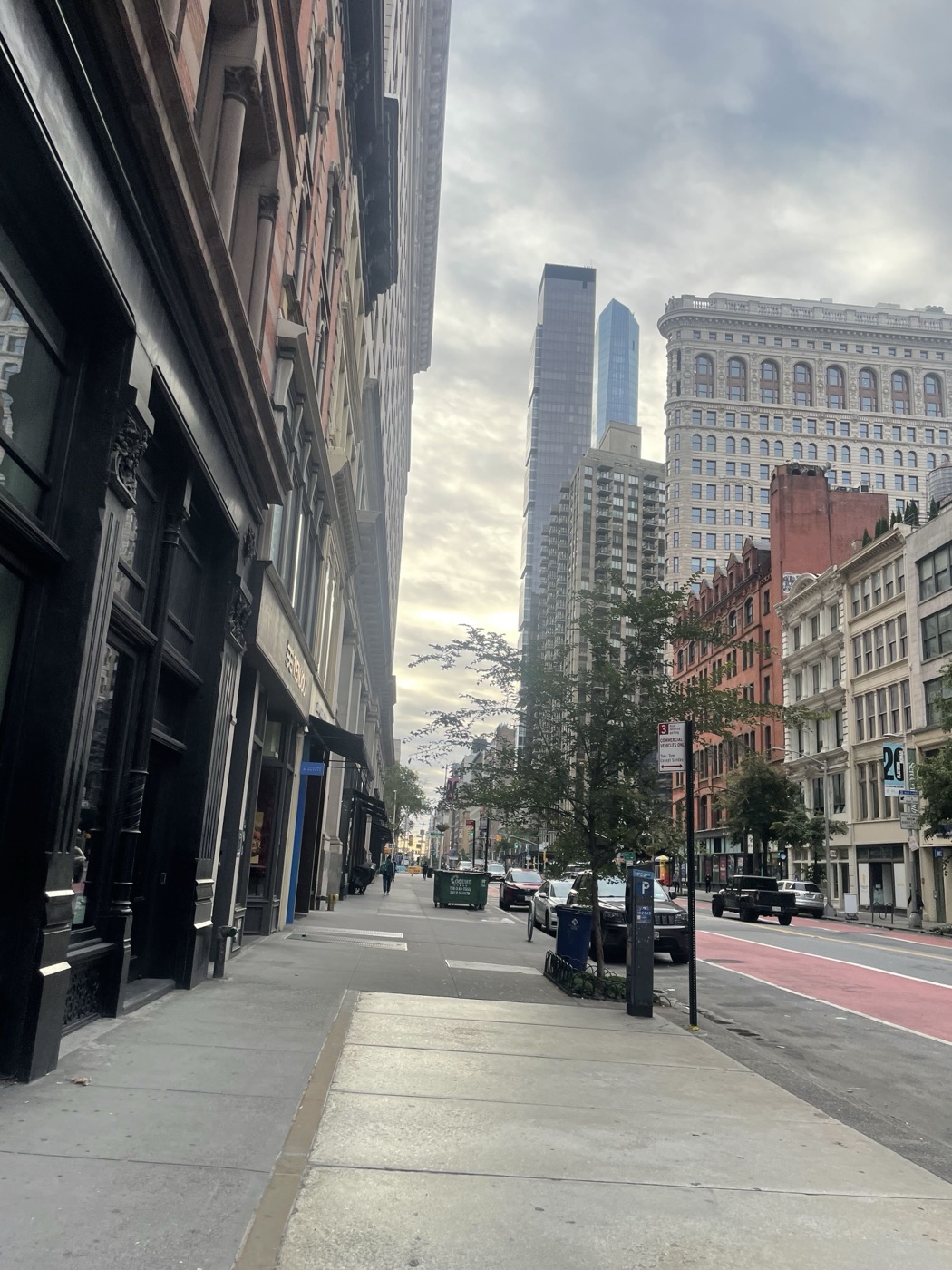 West 23rd Street sidewalk looking toward the Flatiron Building.